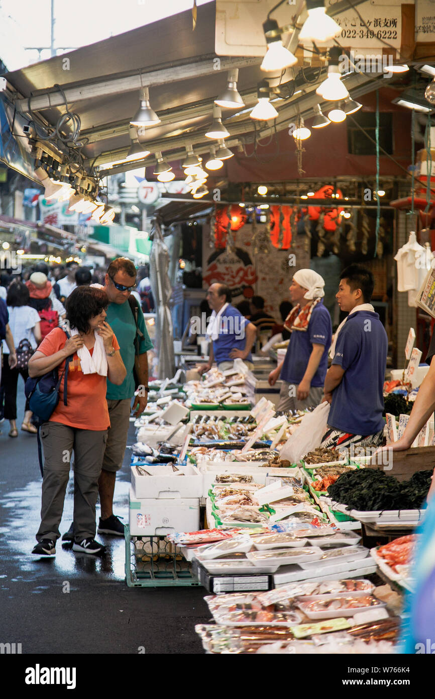 Tokyo, Japan. 4th Aug, 2019. People seen shopping for fresh fish at the Ameya Yokocho market (Ameyoko) in Tokyo.There are about 500 stores along the narrow lane, which is visited by tens of thousands of people every day. Credit: Takahiro Yoshida/SOPA Images/ZUMA Wire/Alamy Live News Stock Photo