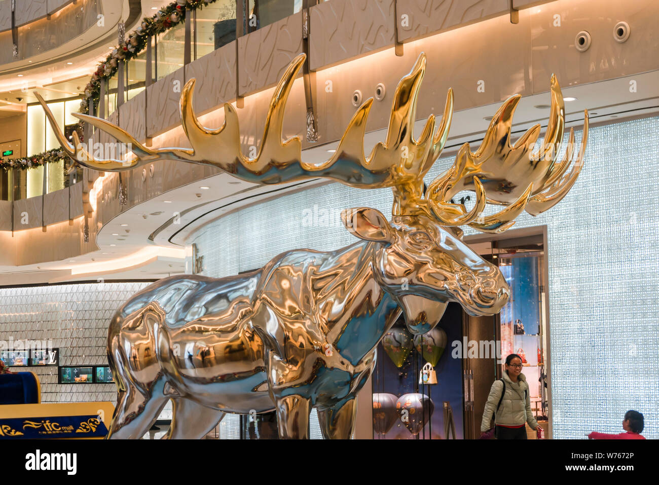 View of a huge moose with golden antlers and silver body on display for the upcoming Christmas at the Shanghai International Finance Centre (IFC) in S Stock Photo