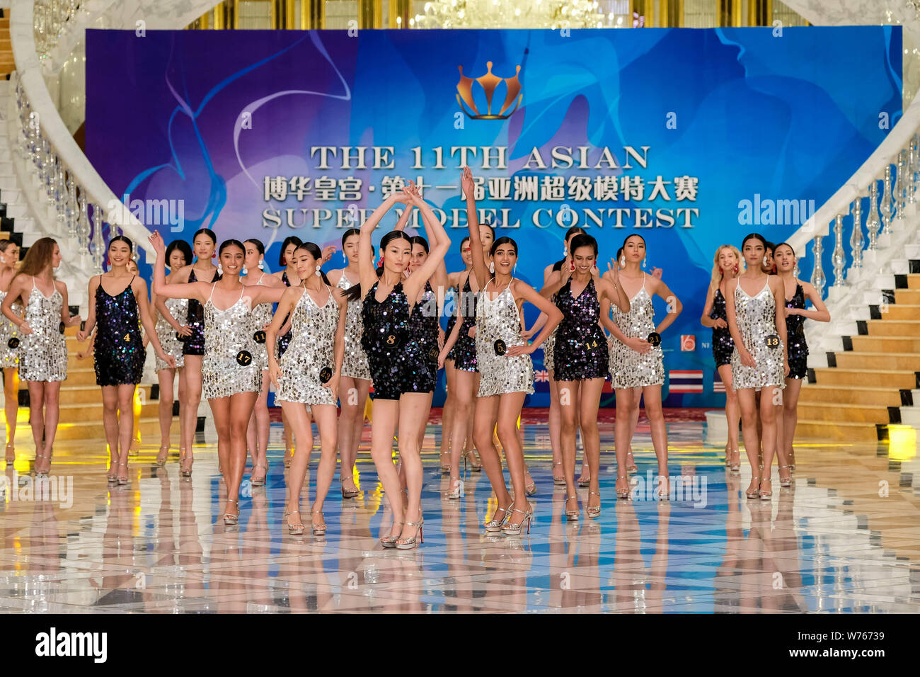 Contestants display creations during the 11th Asian Supermodel Contest at Imperial Palace in Saipan, Northern Mariana Islands, 16 December 2017.   A t Stock Photo