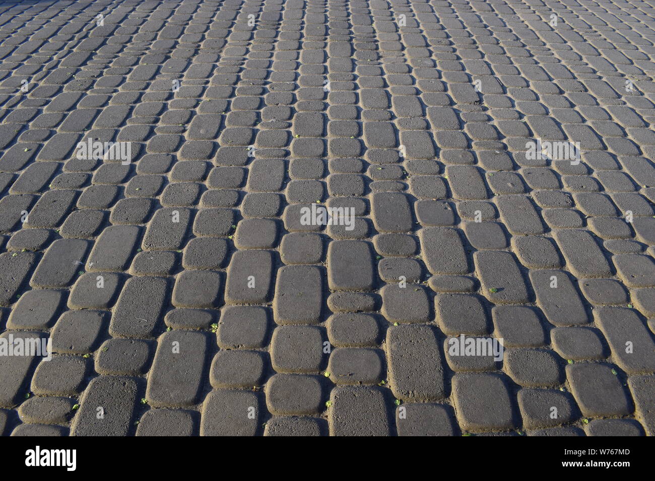 Abstract background - gray paving slabs close-up. Stock Photo