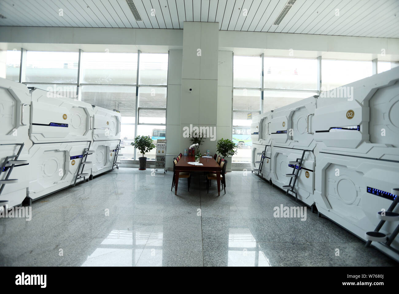 Sleeping capsules are installed in the arrival hall of Terminal 3 at