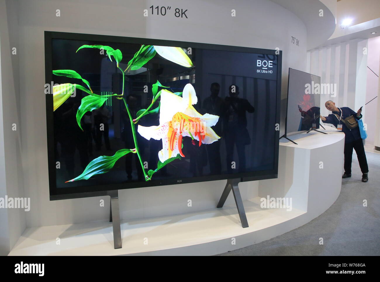 FILE--A 110-inch 8K ultra-high-definition (UHD) LCD television of BOE  Technology is on display during the 14th Optics Valley of China  International Stock Photo - Alamy