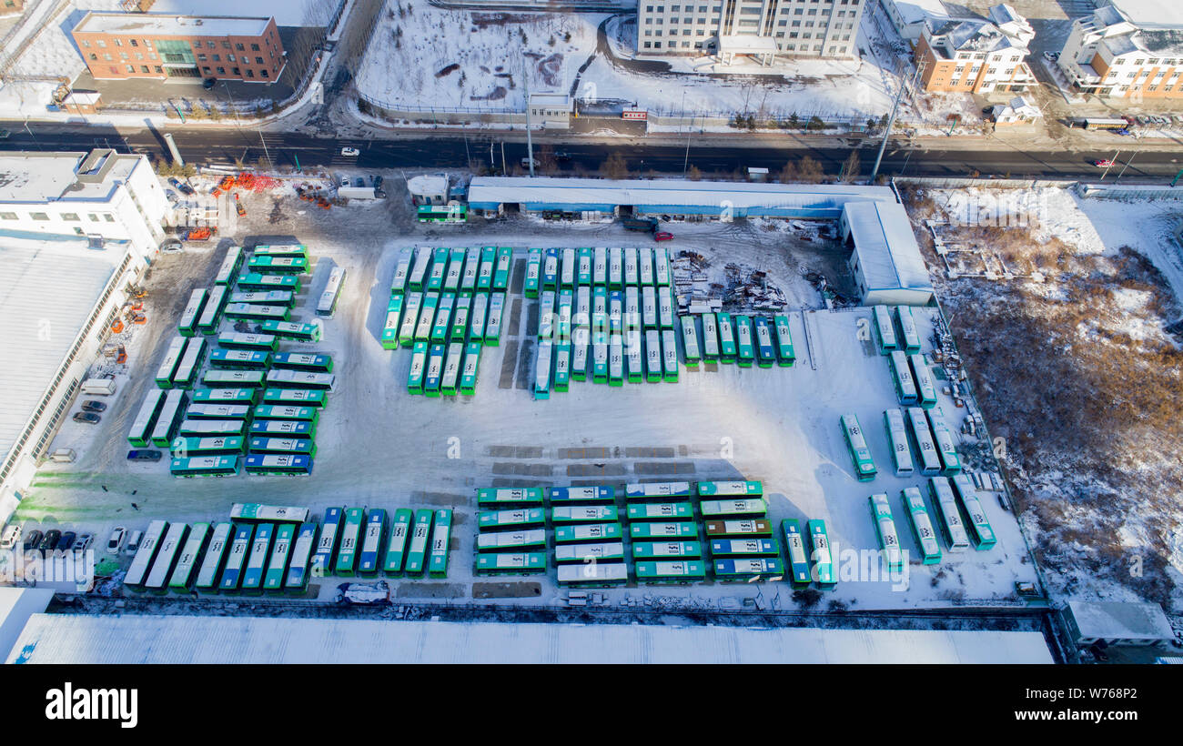 Aerial view of brand new electric buses in a parking space in Jilin city, northeast China's Jilin province, 21 December 2017.   One of northeast China Stock Photo