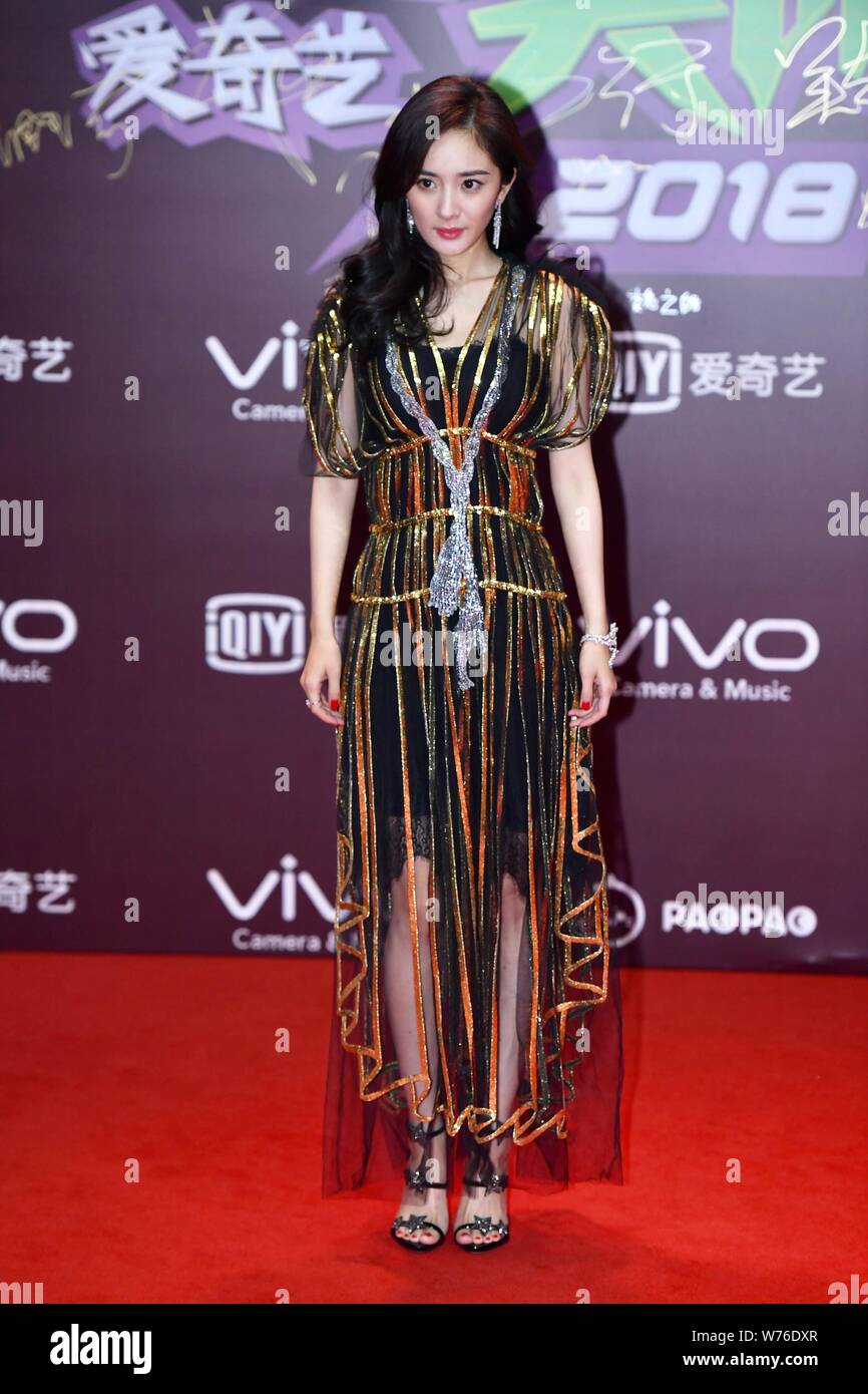 Chinese actress Yang Mi poses as she arrives on the red carpet for