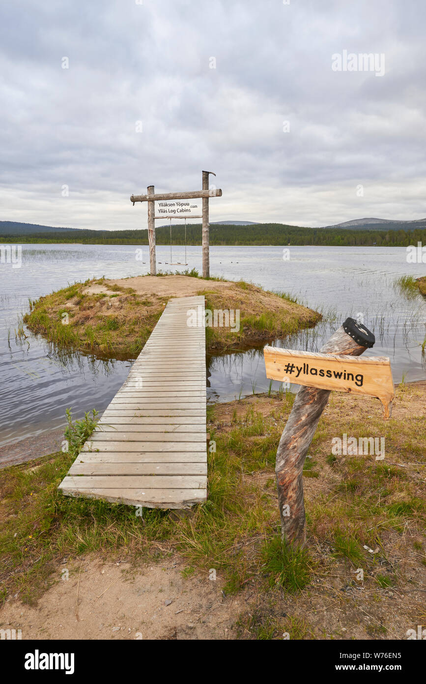 Swing at lake Äkäslompolo, Kolari, Lapland, Finland Stock Photo