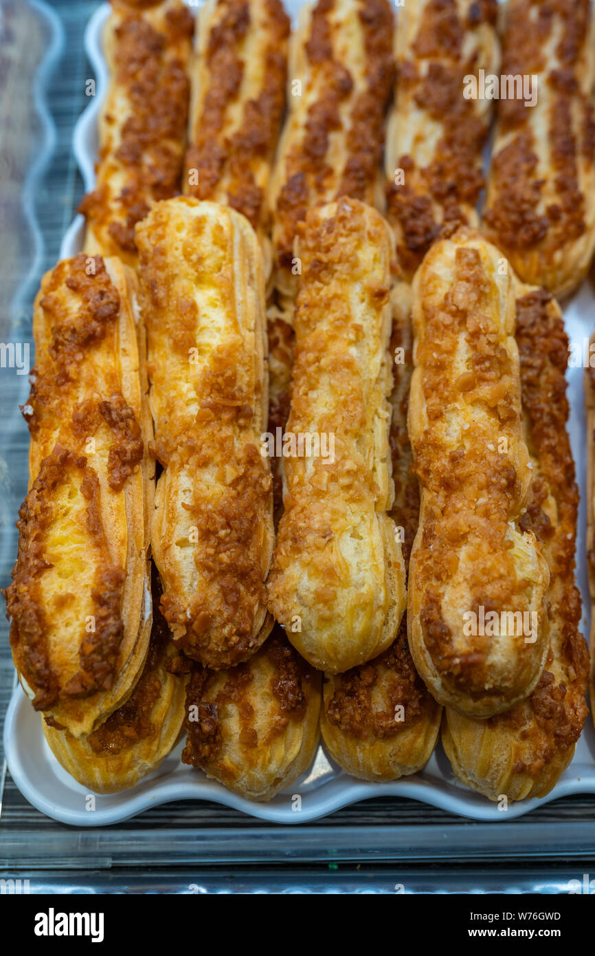 Close up photo of fresh baked choux pastry with caramel Stock Photo - Alamy