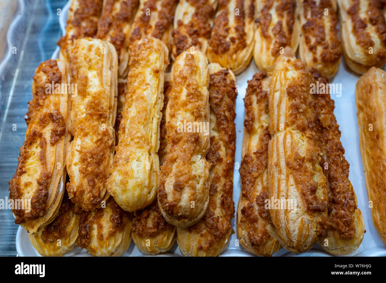 Close up photo of freshly baked choux pastry at bakery Stock Photo - Alamy