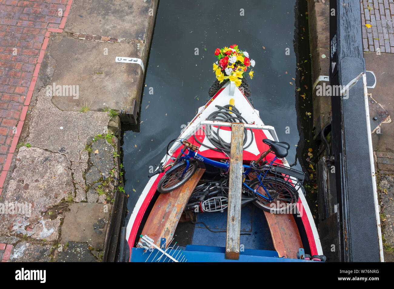 Man steering narrowboat hi-res stock photography and images - Alamy