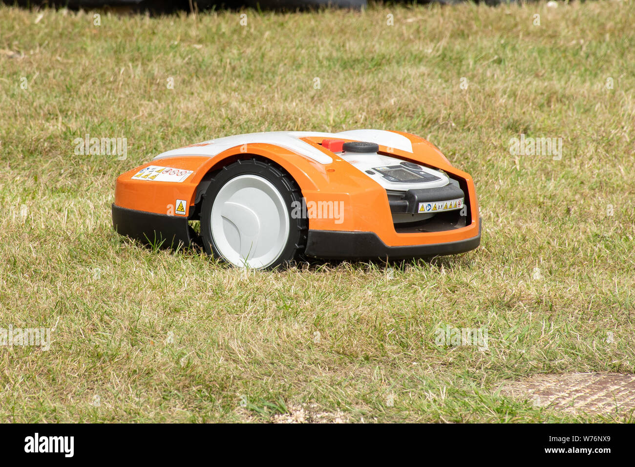 Robotic lawn mower by Stihl, called an iMow Stock Photo