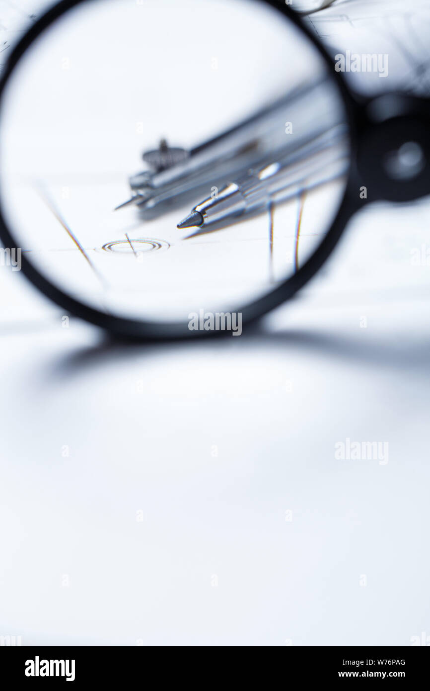Compass on the background detail drawings. Technical drawing. Stock Photo