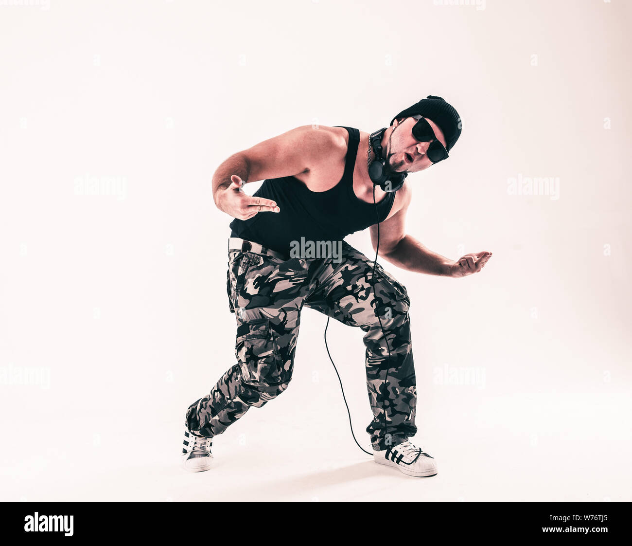 best rapper dancing break dance. photo on a light background. the photo has a empty space for your text Stock Photo