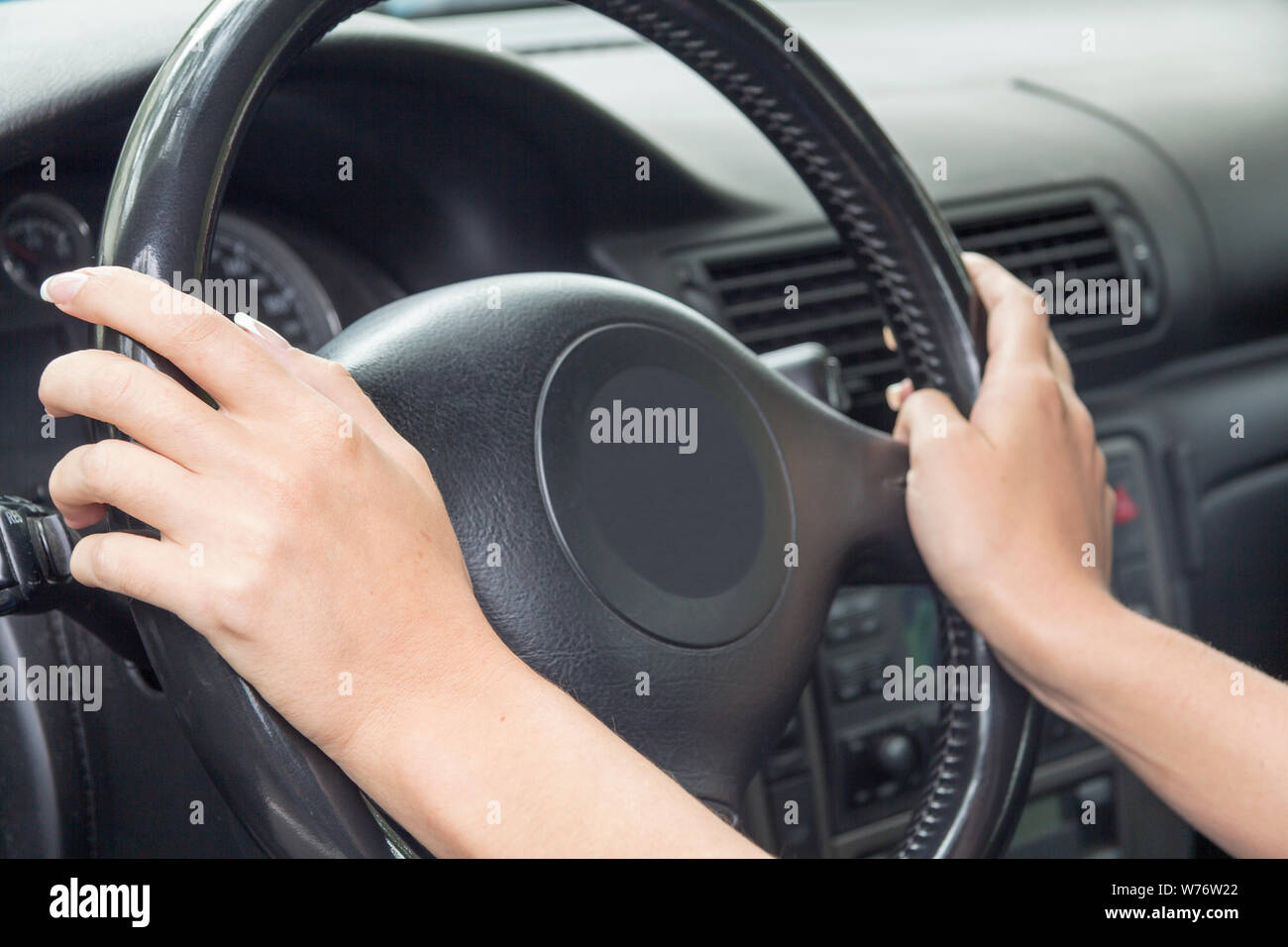 Woman hand steering wheel nails hi-res stock photography and images - Alamy