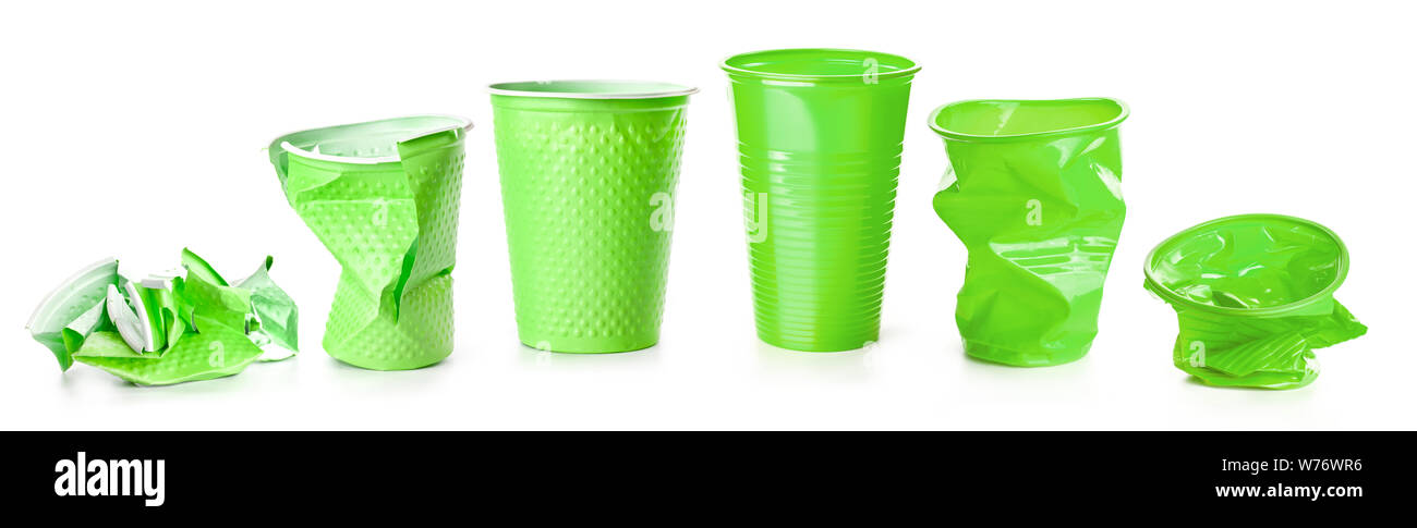 Green plastic cups isolated on white background Stock Photo