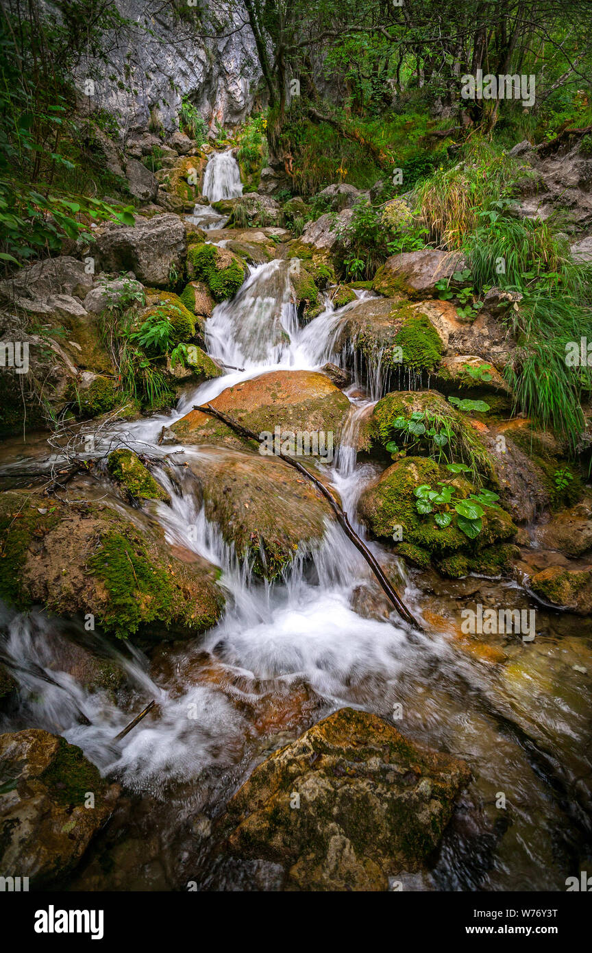 stream splashing on rocks Stock Photo