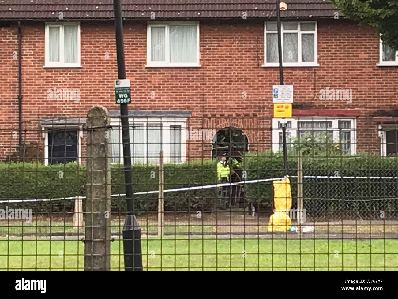Police in Waltheof Gardens in Tottenham, north London after an 89-year-old woman was found murdered in her own home. Stock Photo