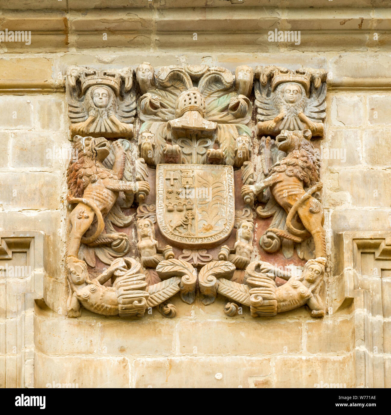 Coat of arms of house owners carved on wall at medieval center in Santillana del Mar, Cantabria, Spain Stock Photo