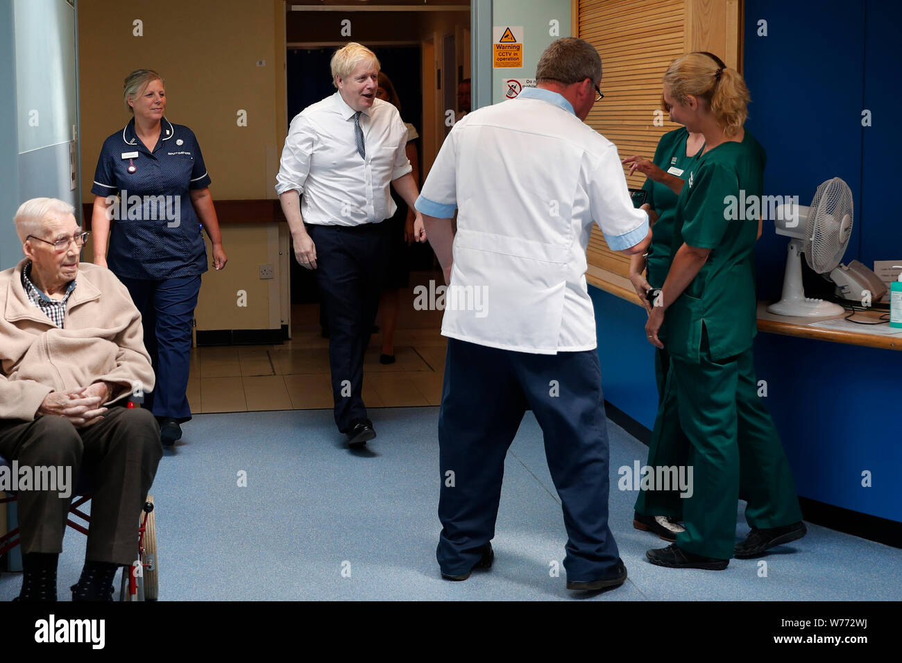 Prime Minister Boris Johnson meets staff during a visit to Pilgrim Hospital in Boston, Lincolnshire, to announce the government's NHS spending pledge of 1.8 billion. Stock Photo
