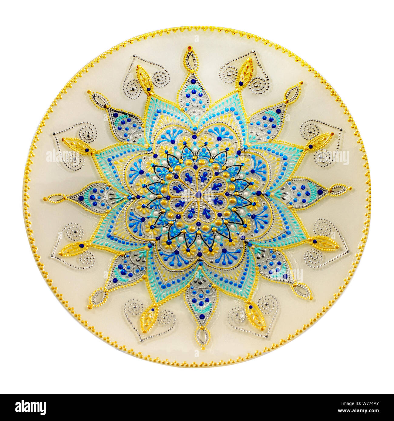 Decorative ceramic dish painted with hands. Art, handmade Stock Photo