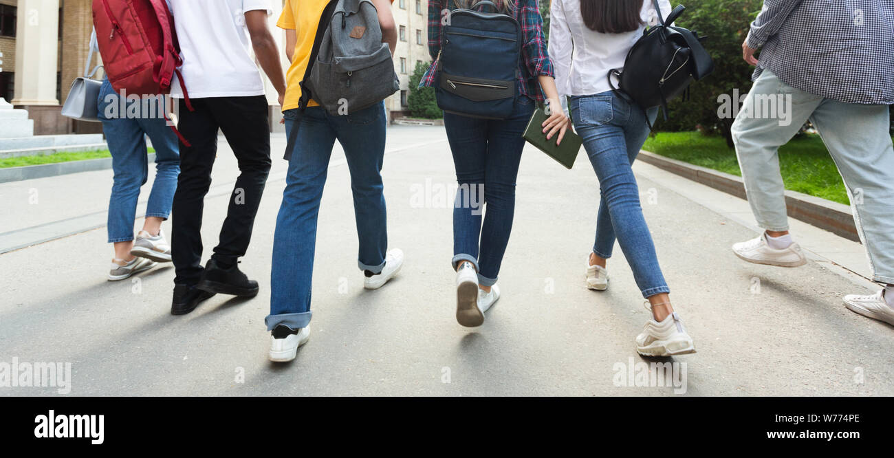 Unrecognizable teenage students in high school campus Stock Photo