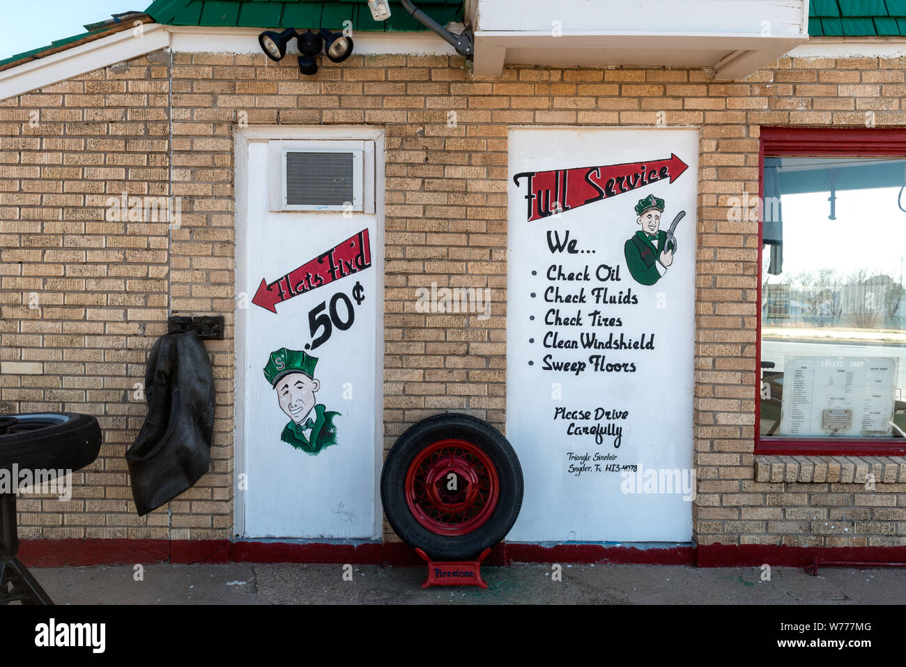 A carefully restored old Sinclair gasoline station in Snyder, the seat