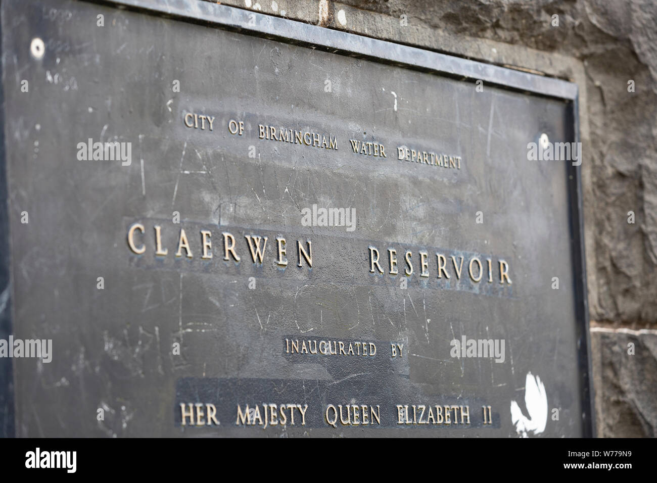 Plaque on Claerwen Dam, Powys, Wales showing Birmingham City Council as original owners and opened by Queen Elizabeth II of England Stock Photo