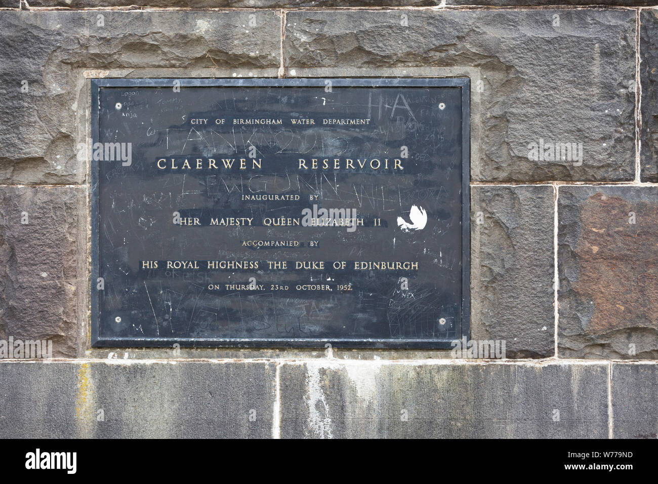 Plaque on Claerwen Dam, Powys, Wales showing Birmingham City Council as original owners and opened by Queen Elizabeth II of England Stock Photo
