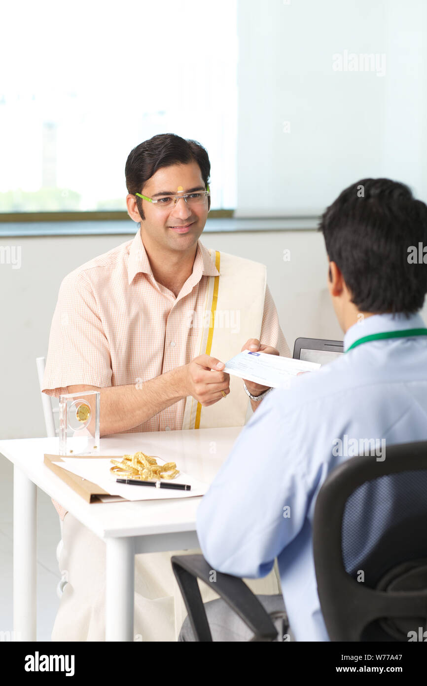 Bank cheque teller hi-res stock photography and images - Alamy