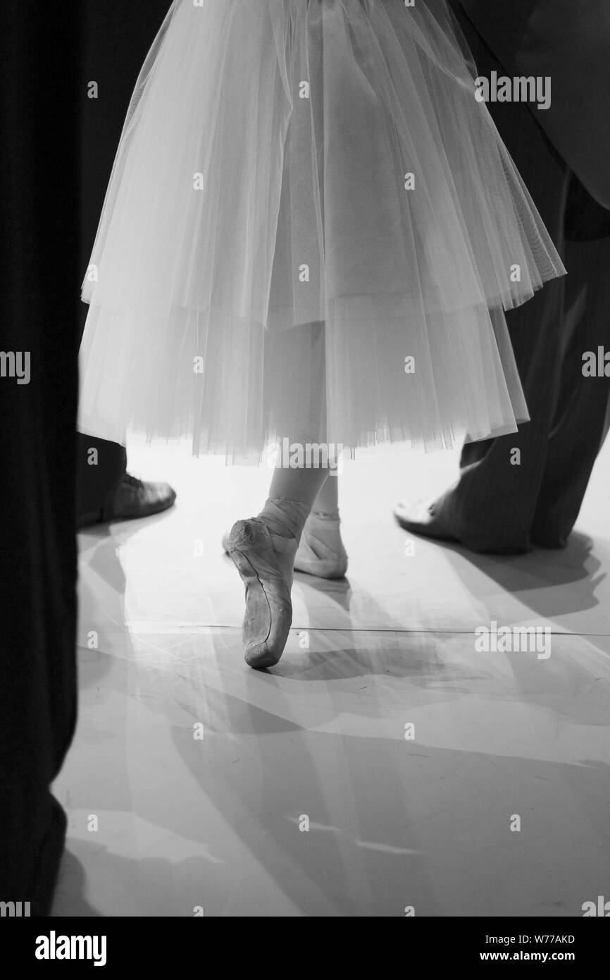 A ballerina awaiting the moment of entering the stage in the play Stock Photo