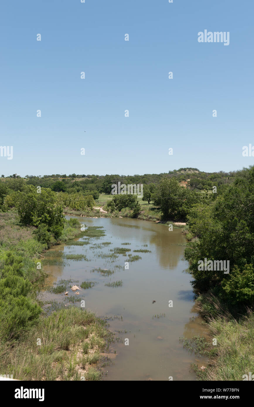 A pleasing view of the Pedernales River, which winds through Texas Hill Country Physical description: 1 photograph : digital, tiff file, color.  Notes: Title, date, and keywords based on information provided by the photographer.; Gift; The Lyda Hill Foundation; 2014; (DLC/PP-2014:054).; Not far away, President Lyndon B. Johnson and his wife, Lady Bird Johnson, loved this river, which crosses the property that Johnson purchased in 1951 from a widowed aunt. The ranch on the land became the Texas White House during Johnson's presidency in the 1960s.; Forms part of: Lyda Hill Texas Collection of P Stock Photo