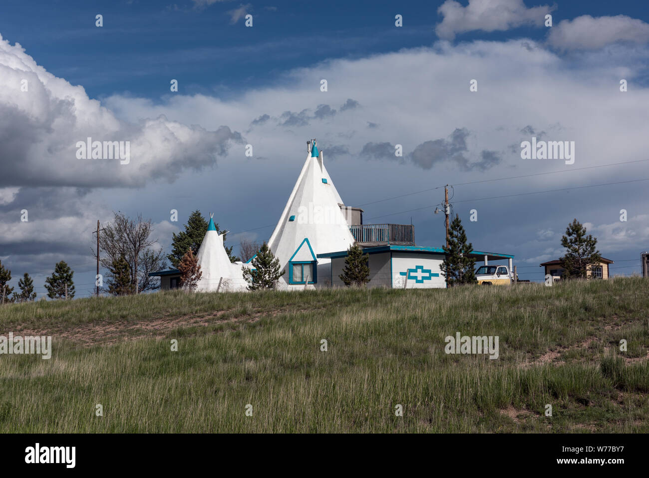 A  private home in the country, with a teepee or wigwam theme and little wigwam additions, but also a modern deck and garage, near Pine Bluffs in Laramie County, Wyoming Physical description: 1 photograph : digital, tiff file, color.  Notes: Forms part of: Gates Frontiers Fund Wyoming Collection within the Carol M. Highsmith Archive.; Stock Photo