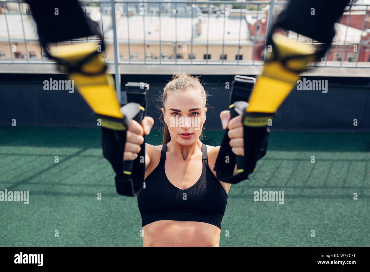 Young muscular woman suspension hi-res stock photography and images - Alamy