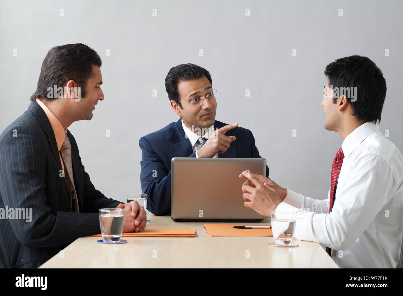 Business executives in an office meeting Stock Photo - Alamy
