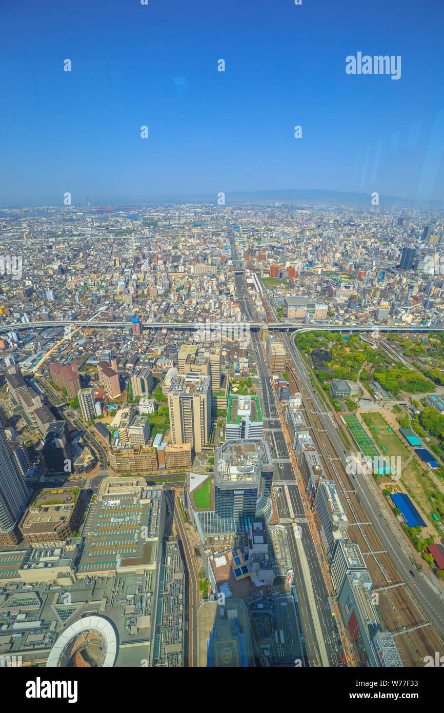 Osaka, Japan - April 30, 2017: aerial view of Osaka skyline and JR Tennoji Station from observation deck at the top of Abeno Harukas, the tallest Stock Photo
