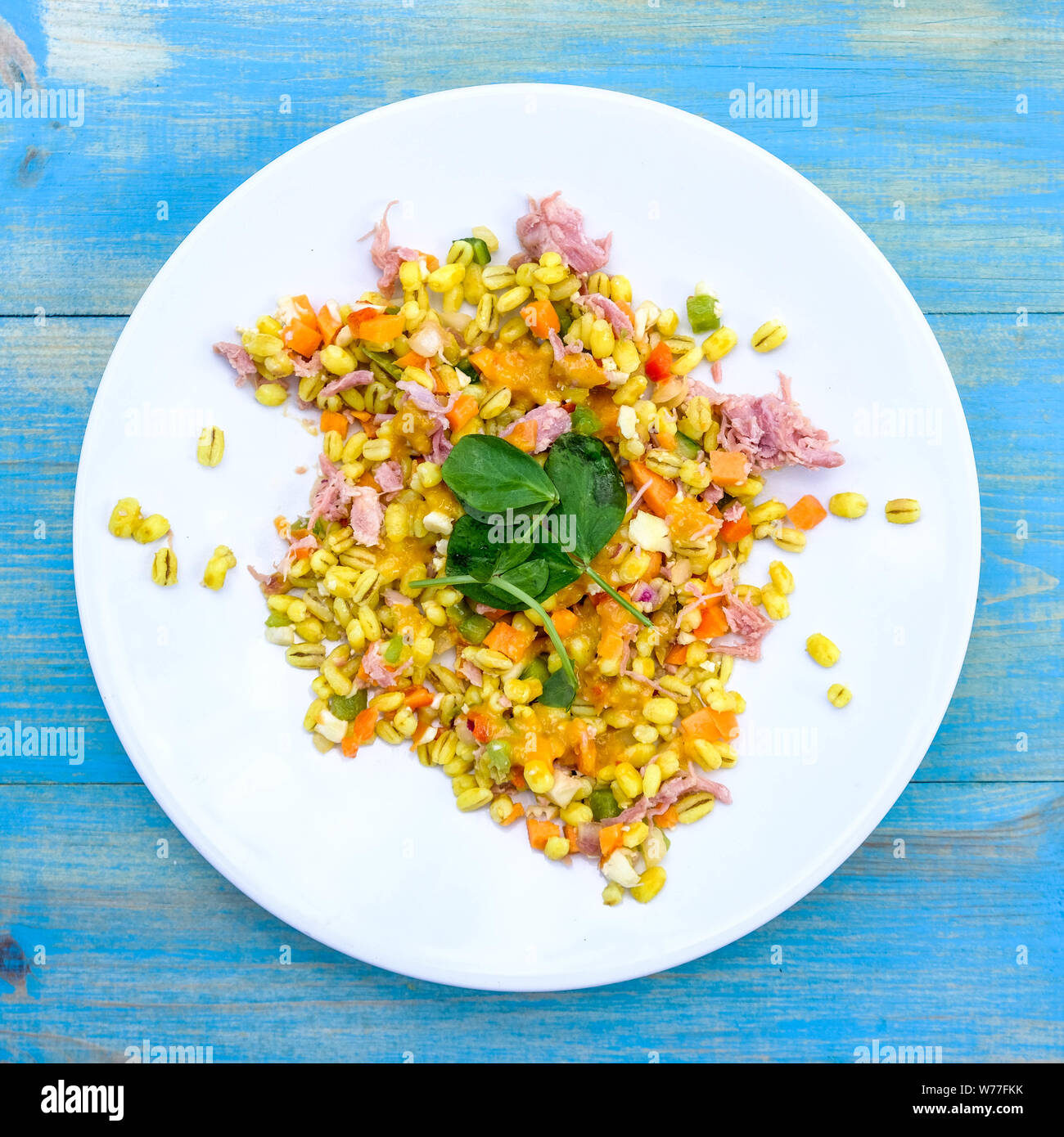Healthy Ham Hock Summer Salad With Pearl Barley Cereals, Peppers and Piccalilli Dressing Stock Photo