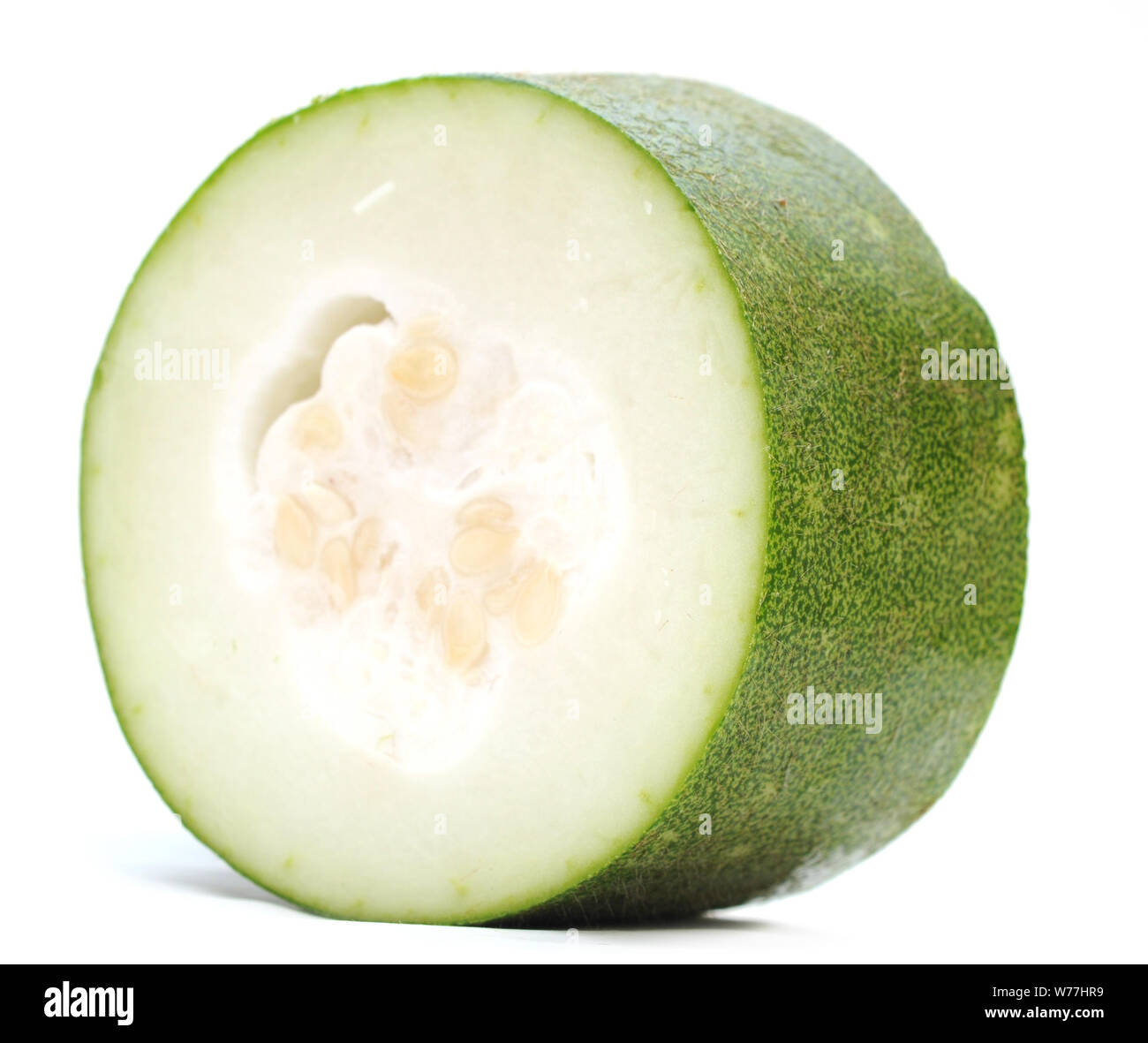 cutting Asian wax squash isolated on white background Stock Photo