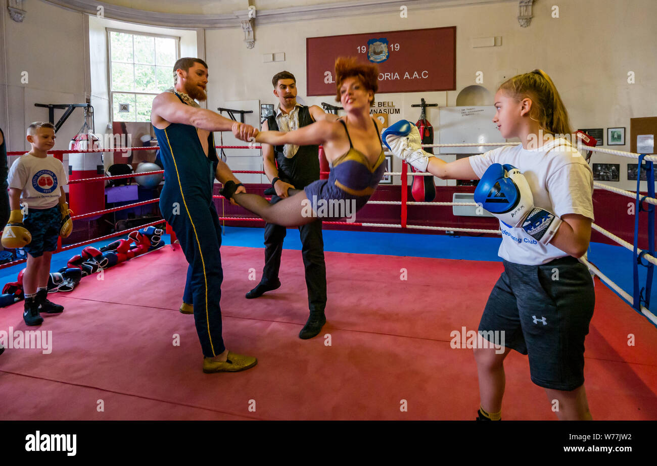 Leith, Edinburgh, Scotland, UK, 5 August 2019. Edinburgh Festival Fringe: Scotland’s oldest boxing club, Leith Victoria AAC holds a masterclass for Australian circus show Le Coup to help them get into the zone for their Fringe show. The class includes the club’s best boxers in their boxing ring staged in their iconic listed building home. Le Coup is based on Fight Night in a travelling boxing tent, produced by Company 2. With Frances Heath, age 15 years and British silver medalist Stock Photo