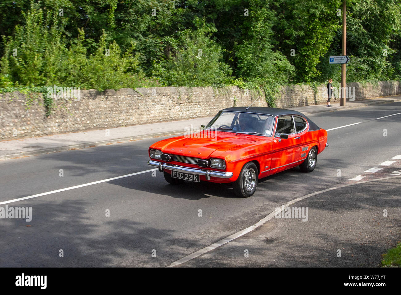 1972 70s seventies Red Ford Capri 3000E en-route to Lytham Hall classic vintage collectible transport festival vehicles show. The Festival of Transport will see a diverse range of classic, 70s vintage and prestige vehicles on display. Stock Photo