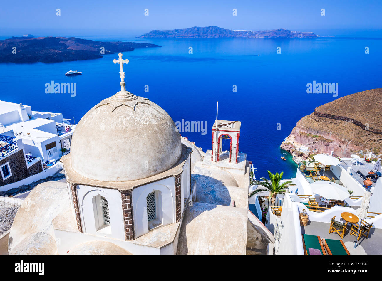 Santorini, Greece. Firostefani blue church and Aegean Sea, Greek Islands. Stock Photo