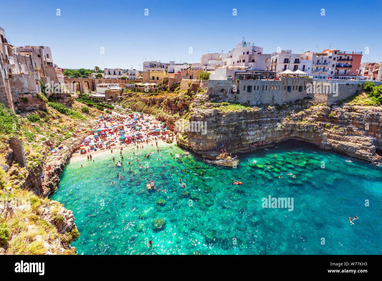 Polignano a Mare, Italy. Summertime beach of Cala Paura in Puglia, Adriatic Sea. Stock Photo