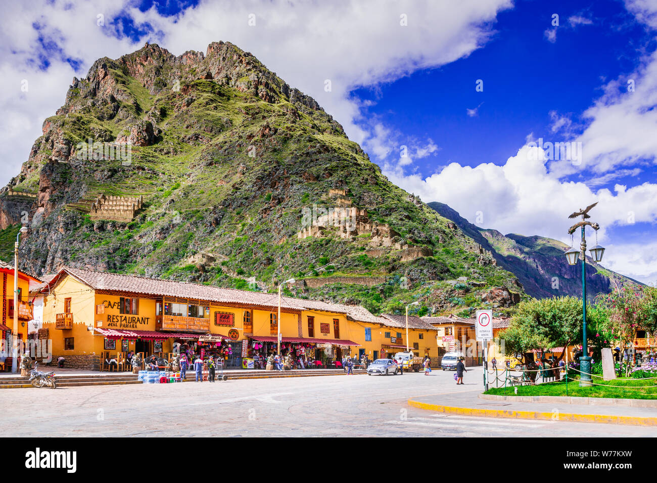 Ollantaytambo, Peru - April 2017: Downtown of the small ancient village Ollantaytambo, with Inca ruins on Andes Mountains. Stock Photo