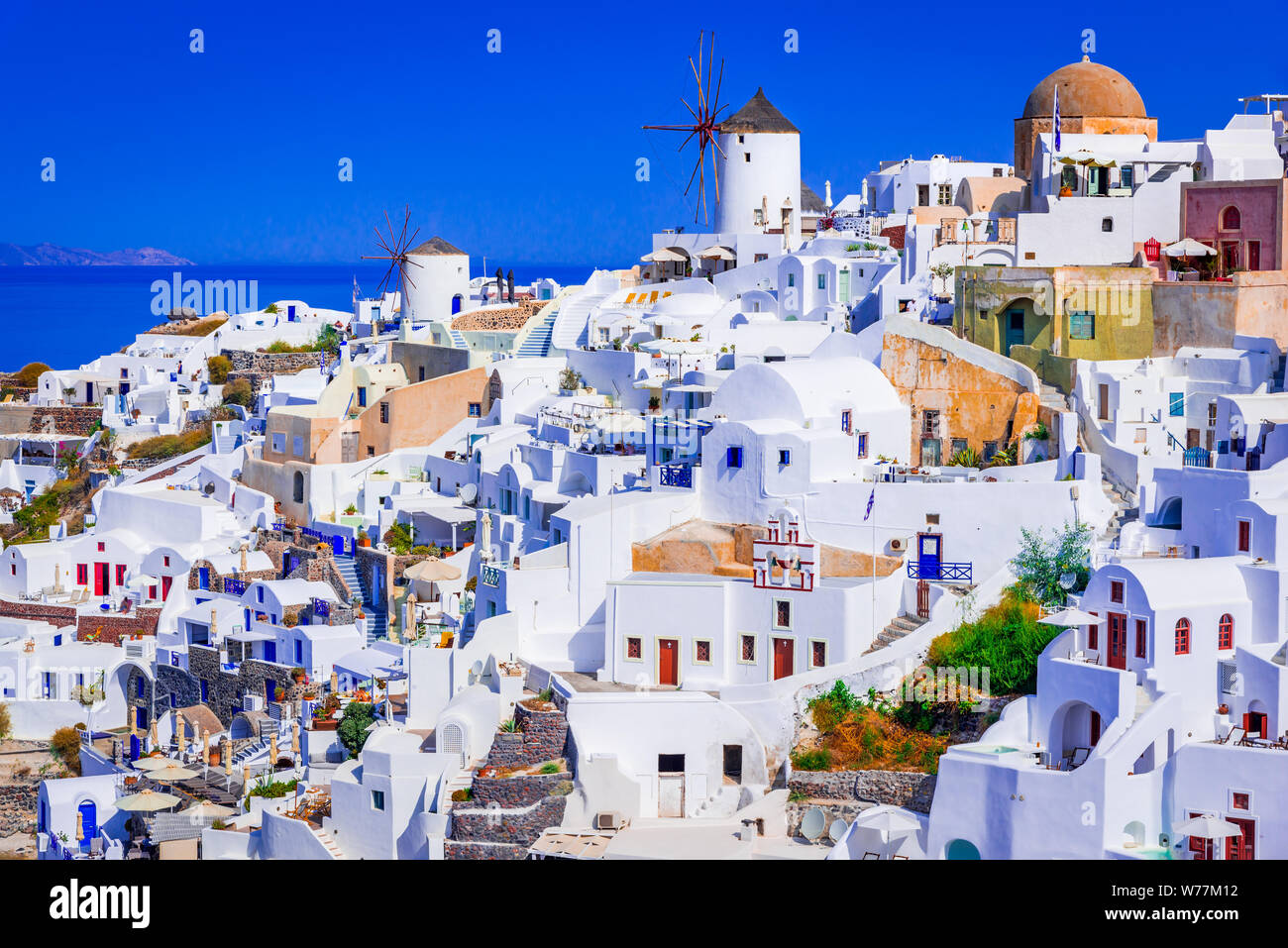 Oia, Santorini, famous whitewashed village with cobbled streets, windmills, Greek Islands, Greece. Stock Photo