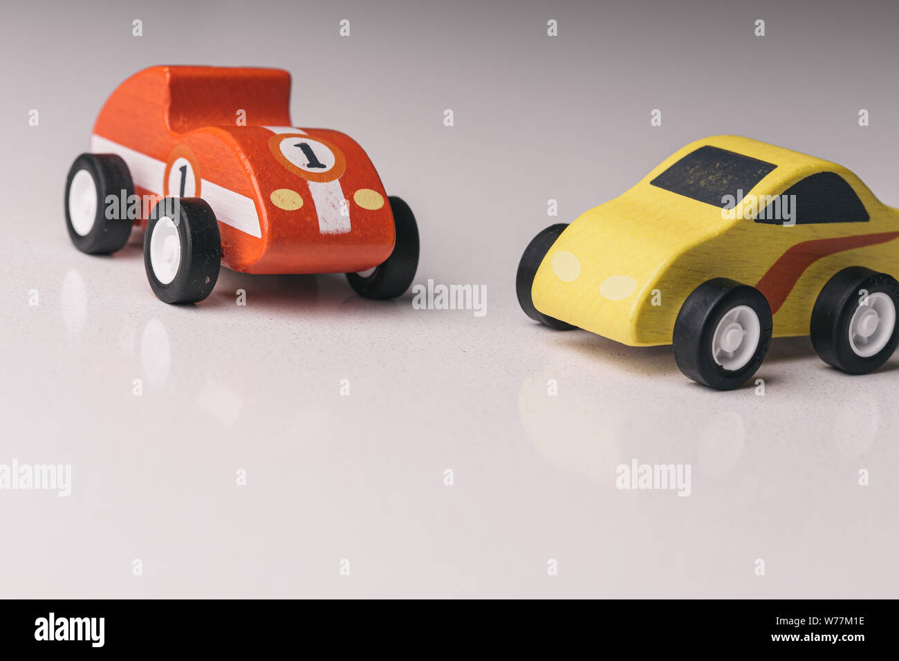 Red and yellow toy car close up on a white background Stock Photo - Alamy