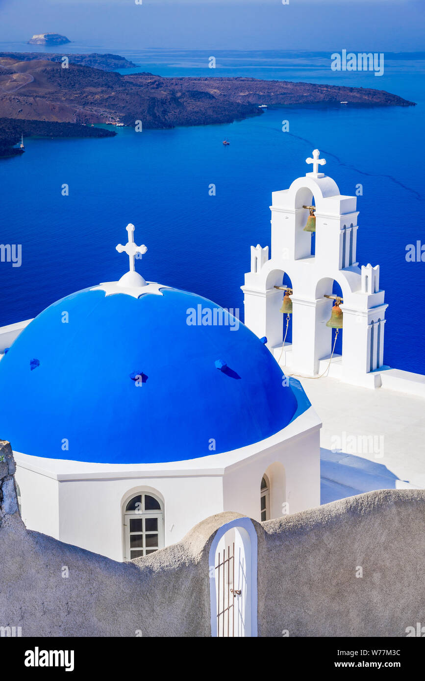 Santorini, Greece. Firostefani blue church and Aegean Sea, Greek Islands. Stock Photo