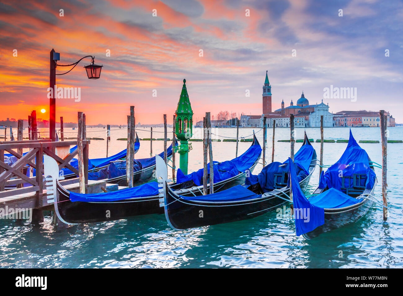 Venice, Italy. Sunrise with Gondolas on Grand Canal, Piazza San Marco, Adriatic Sea. Stock Photo
