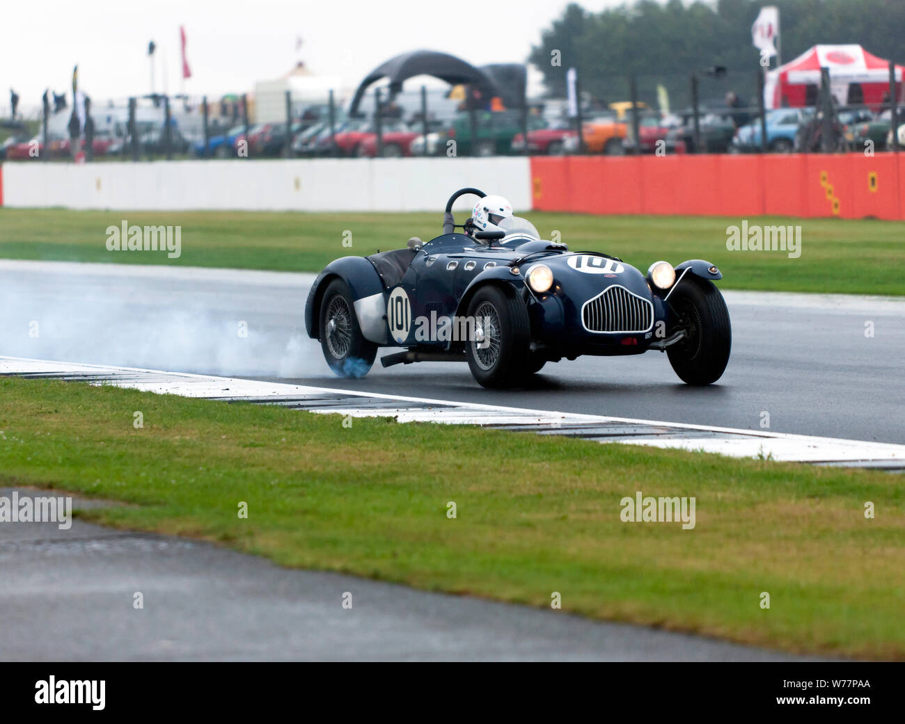 Till Bechtolsheimer driving his 1950, Allard J2, down the Wellington Straight, at Silverstone during the RAC Woodcote Trophy for Pre '56 Sportscars Stock Photo