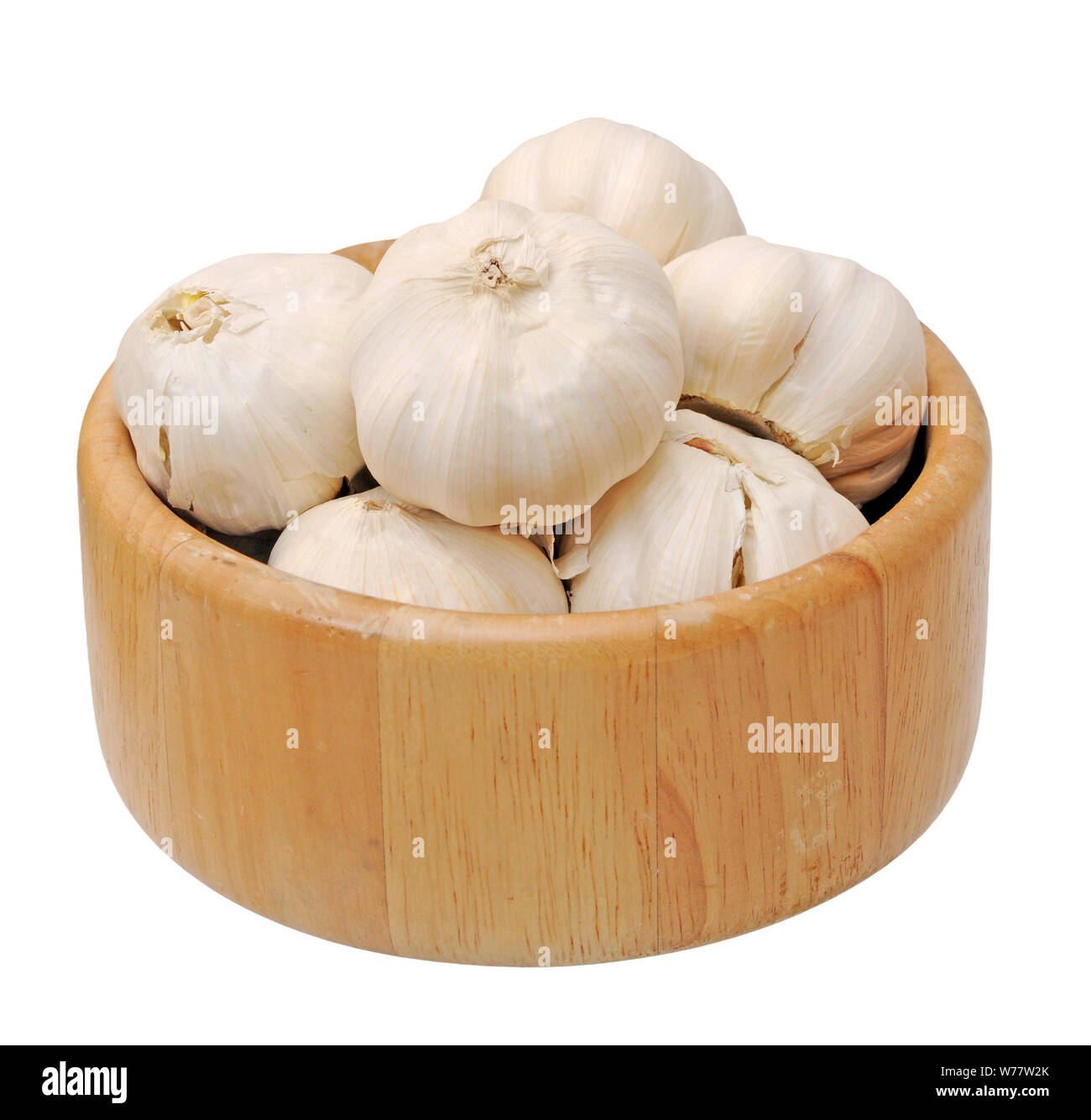garlic in wooden bowl isolated on white background Stock Photo - Alamy