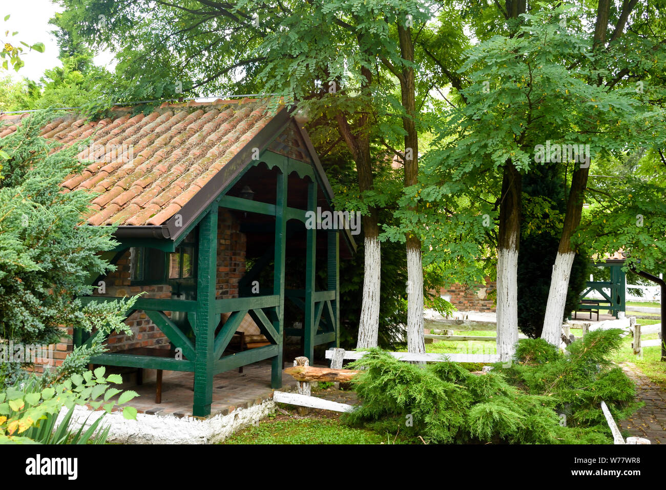 Small wooden houses in ethno village. Stock Photo