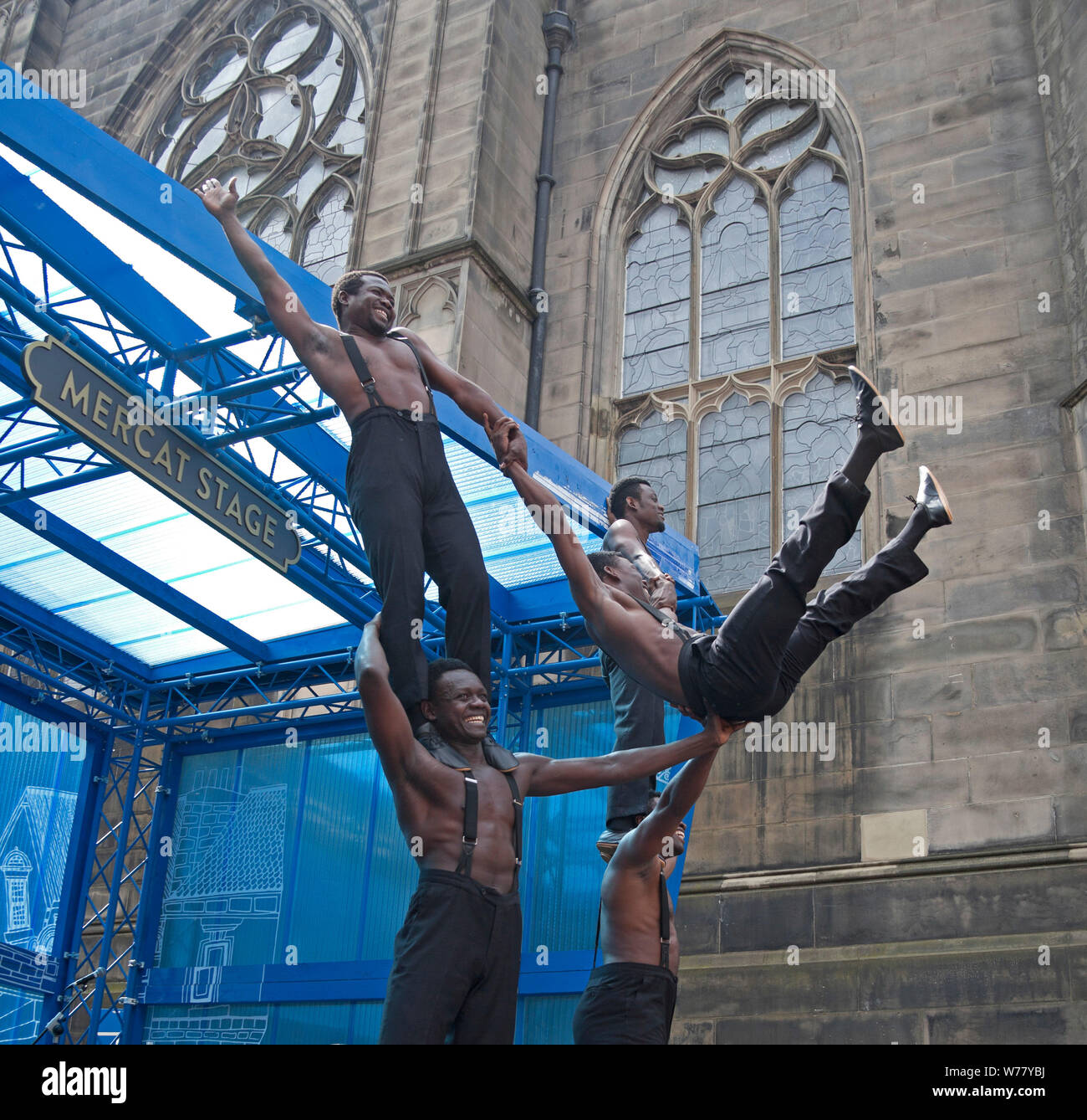 Mercat Stage, Royal Mile, Edinburgh Fringe, Scotland, UK. 5th August 2019. The Black Blues Brothers. promote their show, 'Dance, Physical Theatre and Circus (acrobatics, comedy)'The circus show that everyone is talking about! Joining the energy of Africa with a rhythm and blues sound, five unleashed acrobats perform their comedy tribute to cult movie, The Blues Brothers. Stock Photo