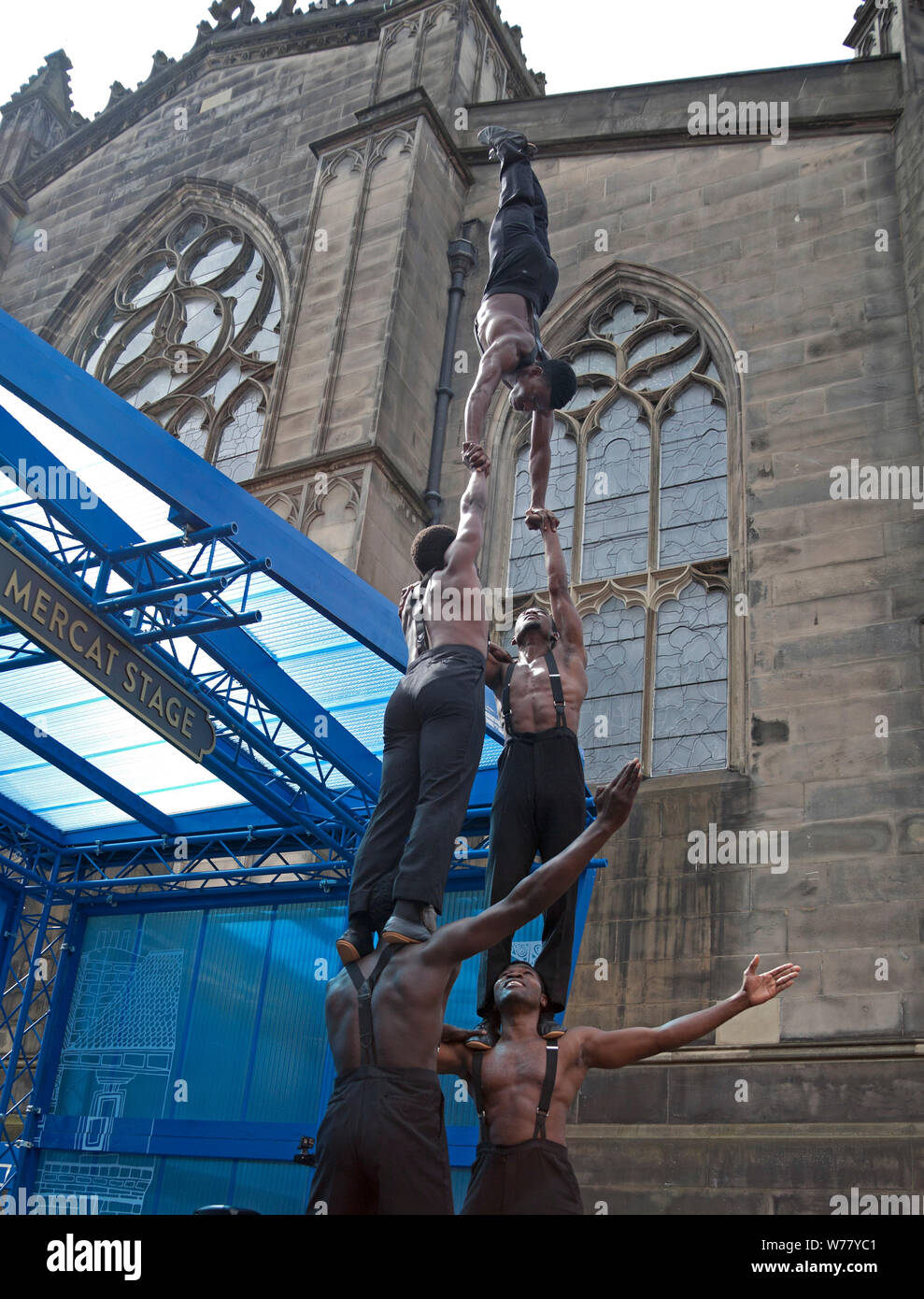Mercat Stage, Royal Mile, Edinburgh Fringe, Scotland, UK. 5th August 2019. The Black Blues Brothers. promote their show, 'Dance, Physical Theatre and Circus (acrobatics, comedy)'The circus show that everyone is talking about! Joining the energy of Africa with a rhythm and blues sound, five unleashed acrobats perform their comedy tribute to cult movie, The Blues Brothers. Stock Photo