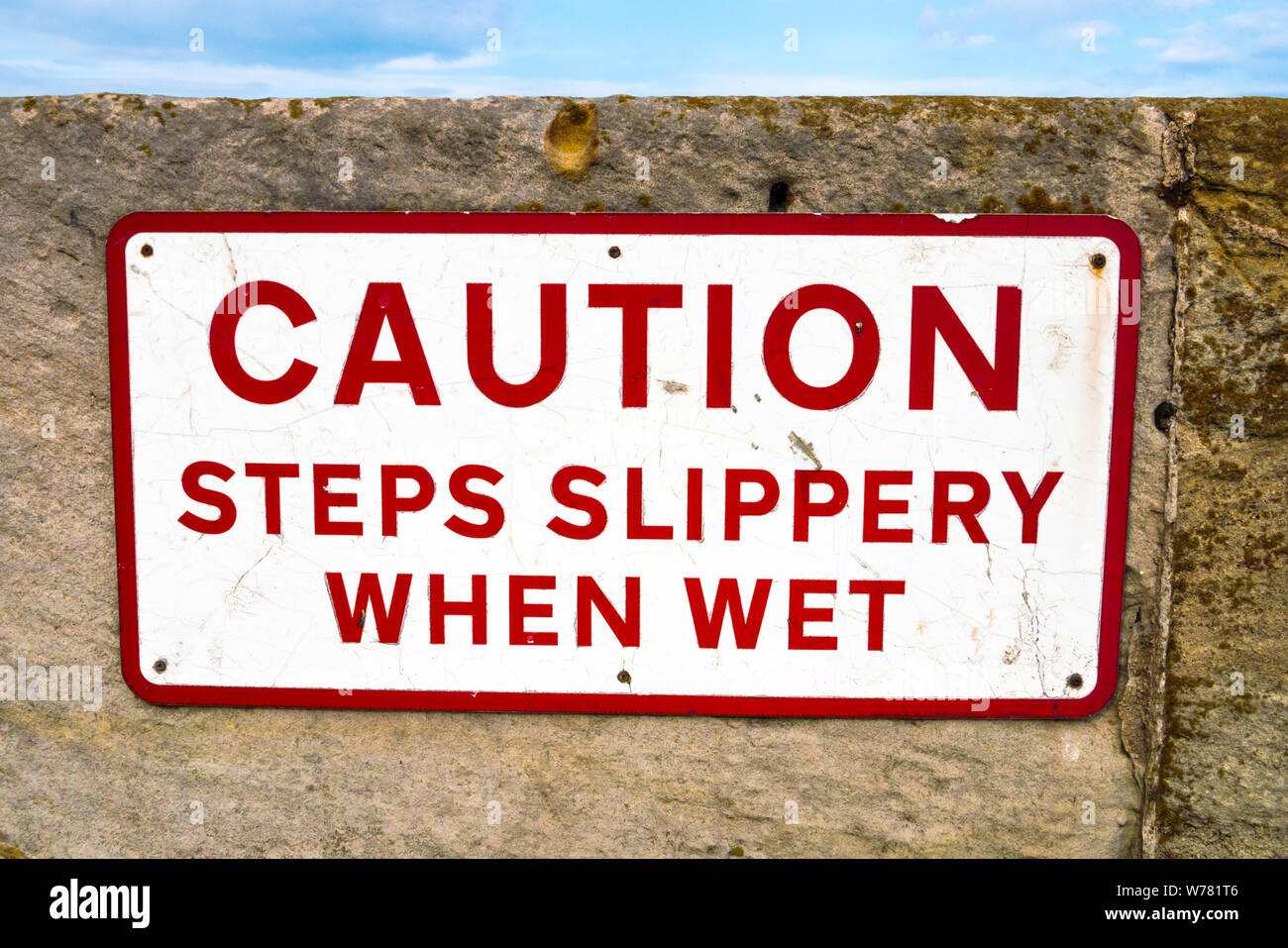'Caution Steps Slippery When Wet' Signage Stock Photo